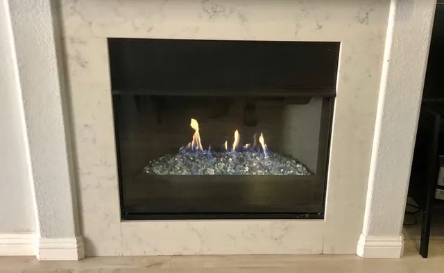 After: New panel with silver-blue fire glass
