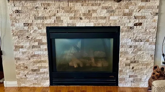 Before: Amber fire glass and new panel