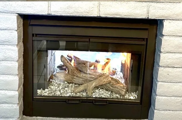 After: New log set and fireplace frame